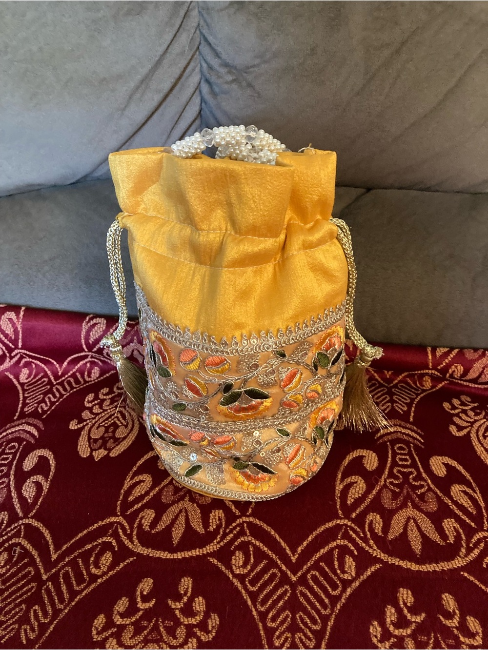 Yellow Embroidered Drawstring Potli Bag with Pearl Handle